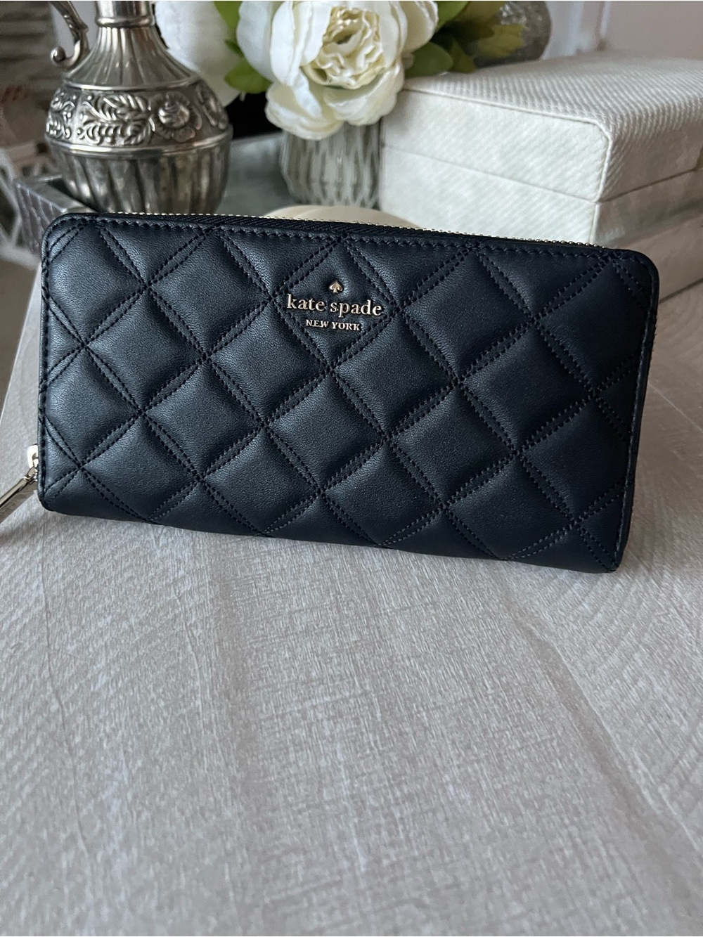 kate spade Quilted Black Zip-Around Wallet with Gold Logo